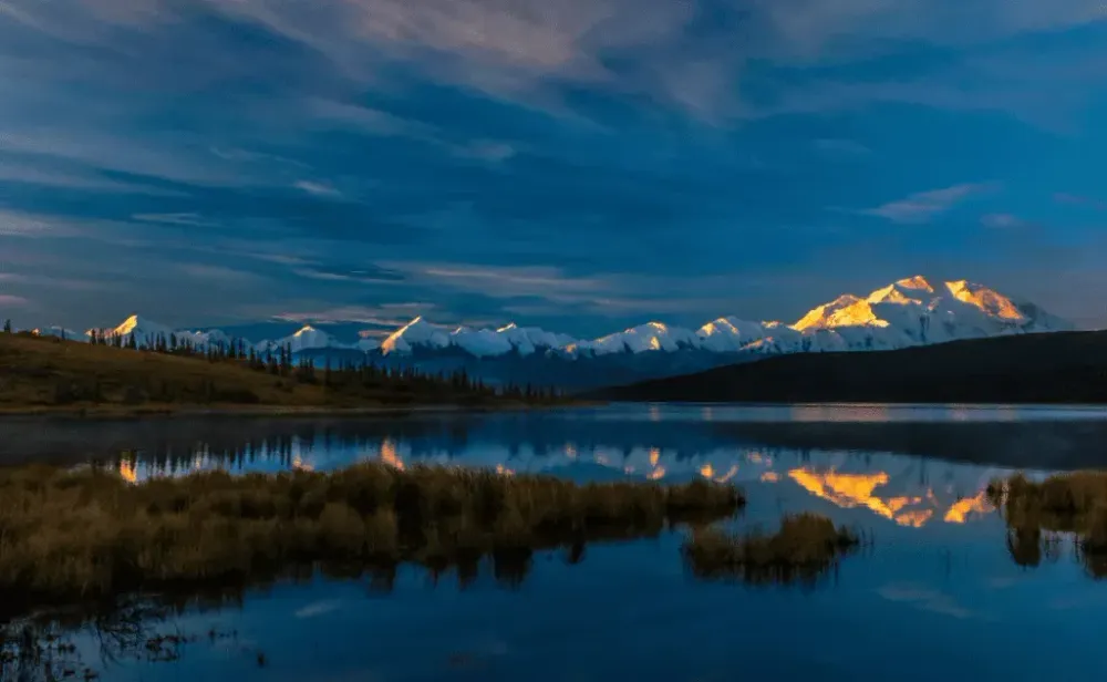 Sunrise on Mount Denali at Wonder Lake - Alaska Range, Denali National Park and Preserve, Alaska - shot at Sunrise.